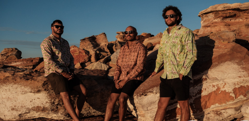 Nagula Jarndu Designs, “Country on Cloth”, 2023. First Nations models Ben Phillips, Joel Ryman & Dion Parriman modelling the 'Manawan', 'Hill Country' & 'Yarrinyarri' men's shirt range at Gantheume Point, Broome. Photo credit: Michael Torres.