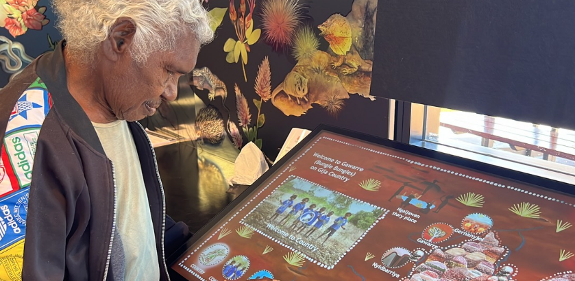 Senior Custodian Shirley Drill with the Jirraginy joo Goorrarndal—Frog and Brolga interactive display panel at Purnululu National Park. Credit: SharingStories 