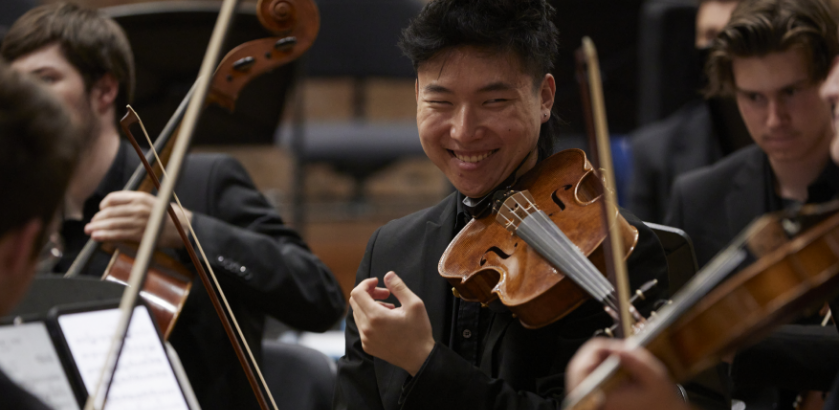 Violin/viola players and cellow players in an ensemble.