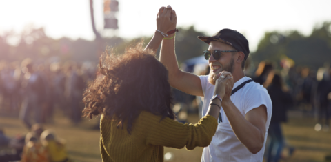 Couple Dancing At Music Festival