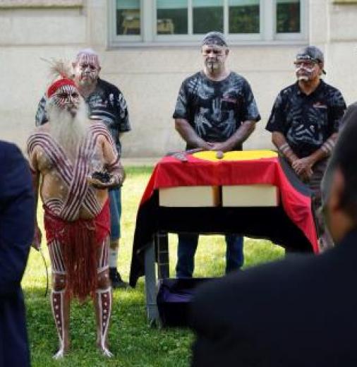 epatriation ceremony out the front of the Smithsonian Institute, National Museum of Natural History, Washington D.C. Kaurna Elder Major Sumner performs a smoking to prepare the ancestors for their journey home